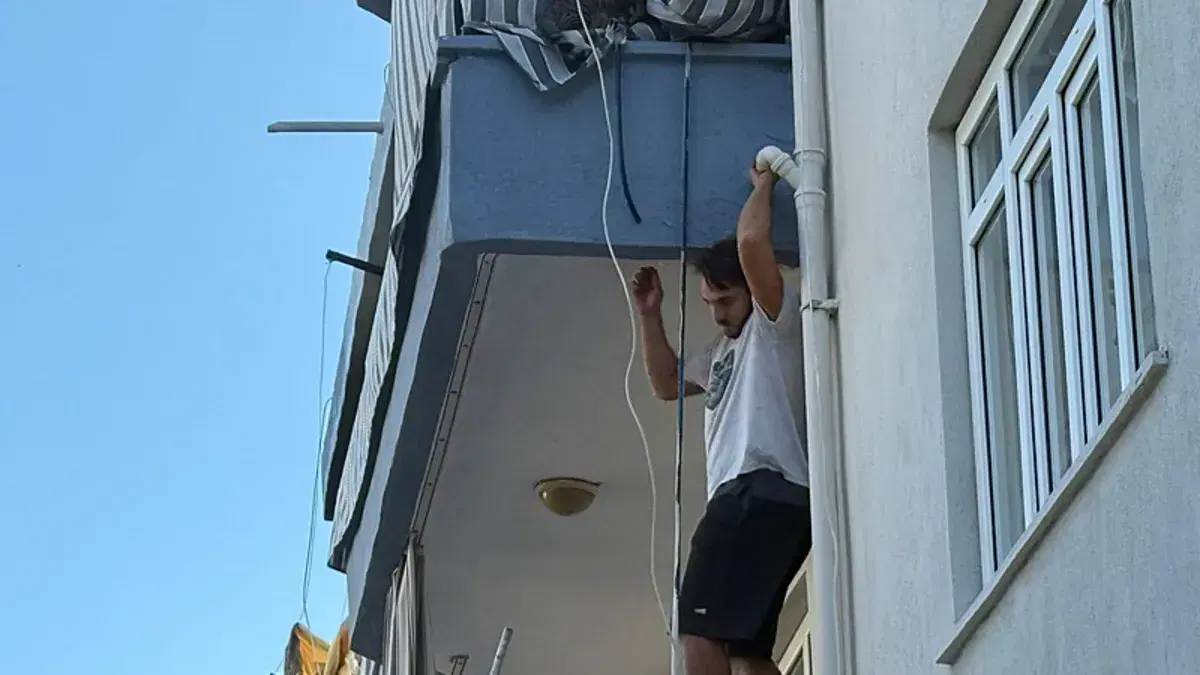 Antalya'da ev sahibi dairesini ateşe verdi, kiracı alevlerin arasından kediyi kurtardı